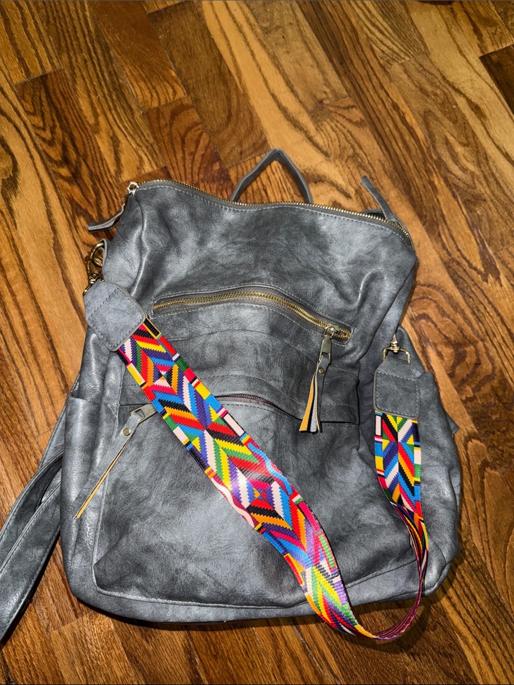 Gray Faux Leather Backpack with Colorful Woven Strap